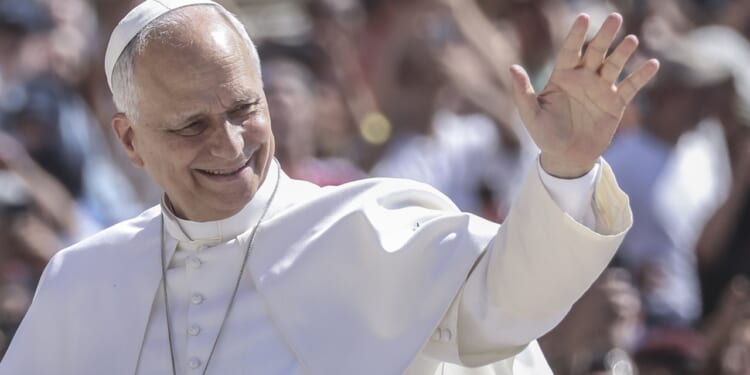 Pope Leo XIV waving and smiling