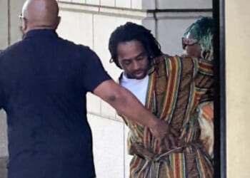 DC Councilman Trayon White Sr. is escorted out of the federal courthouse on August 19, 2024.