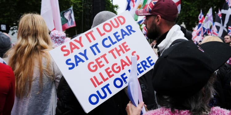 British citizens protest their country's immigration policies at a Unite the Kingdom rally in London on May 16, 2026.