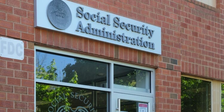 A general view of the Social Security Administration sign on a building's wall.