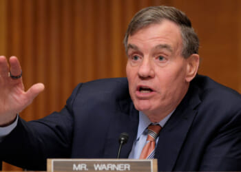 Mark Warner speaks in a Senate hearing.