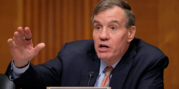 Mark Warner speaks in a Senate hearing.