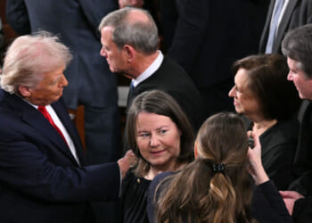 President Donald Trump shakes hands with Supreme Court Justice Elena Kagan (2R) as he arrives to deliver his State of the Union address in the House Chamber of the US Capitol in Washington, DC, on February 24, 2026. (Photo by Mandel NGAN / AFP via Getty Images)