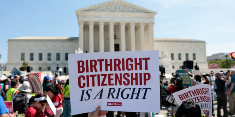 Demonstrators rally in support of birthright citizenship outside the US Supreme Court in Washington, DC on April 1, 2026. President Donald Trump attended in person as the US Supreme Court heard a landmark case weighing the constitutionality of his contentious bid to end birthright citizenship, an extraordinary and possibly unprecedented move for the nation's highest office. (Photo by Kent Nishimura / AFP via Getty Images)
