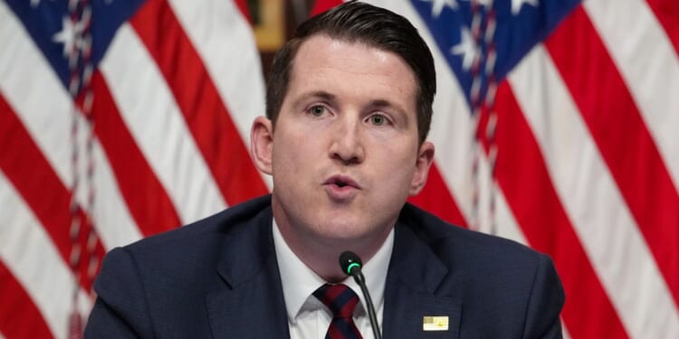 Assistant Attorney General Colin McDonald speaks during a roundtable discussion in the Eisenhower Executive Office Building on the White House Campus in Washington on May 26, 2026.