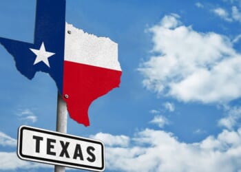 A Texas sign on a traffic sign.