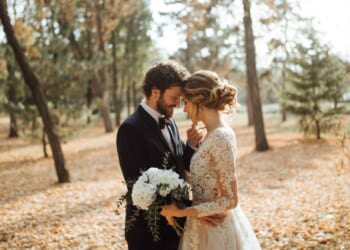 A beautiful couple in a park.
