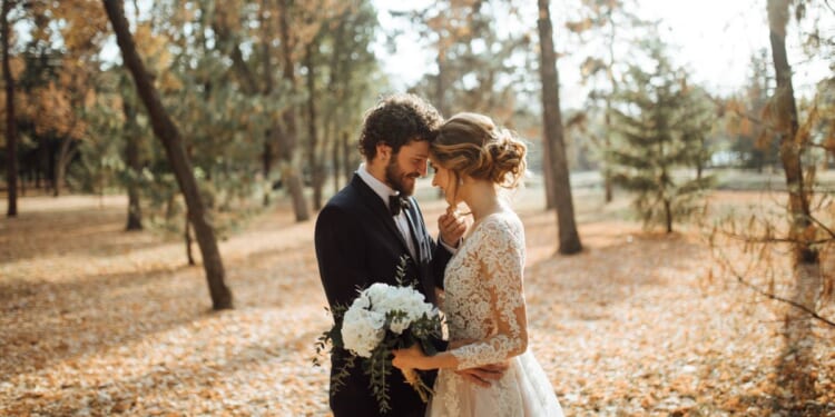 A beautiful couple in a park.