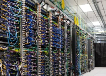 Wires from Amazon Web Services Trainium3 UltraServers are seen at a QA lab in Austin, Texas, on Feb. 3, 2026.