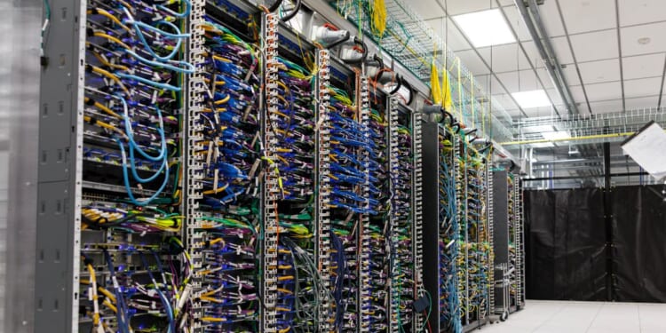 Wires from Amazon Web Services Trainium3 UltraServers are seen at a QA lab in Austin, Texas, on Feb. 3, 2026.