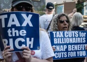 A coalition of activist groups participates in a demonstration against the "Big Beautiful Bill" in front of Trump Tower on July 4, 2025, in New York City.