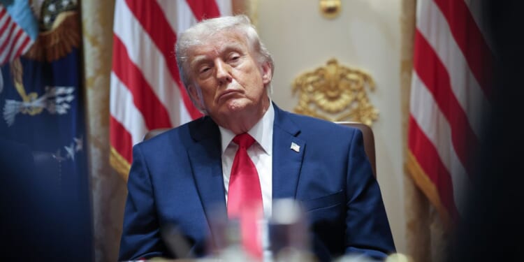 President Donald Trump listens to members of his Cabinet speak during a meeting in the Cabinet Room of the White House on May 27, 2026, in Washington, D.C.