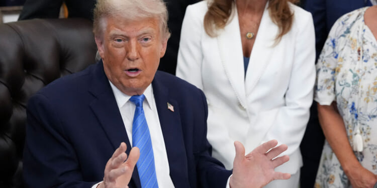 Donald Trump speaks during a signing ceremony for the "Secure America Act" in the Oval Office of the White House in Washington, DC, on June 10, 2026.
