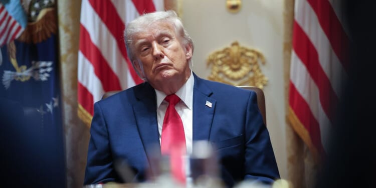 President Donald Trump listens to members of his Cabinet speak in the Cabinet Room of the White House in Washington on May 27, 2026.
