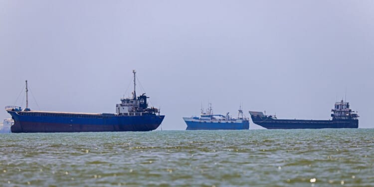 In this picture obtained from Iran's ISNA news agency on June 18, 2026, vessels are seen anchored in Bandar Abbas along the Strait of Hormuz.