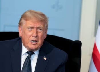 President Donald Trump talks as he meets French President Emmanuel Macron for a bilateral meeting at Hotel Royal Evian on June 15, 2026, in Évian-les-Bains, France.