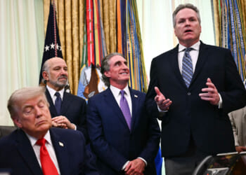 President Donald Trump, Commerce Secretary Howard Lutnick and Interior Secretary Doug Burgum listen to Alaska Governor Mike Dunleavy.
