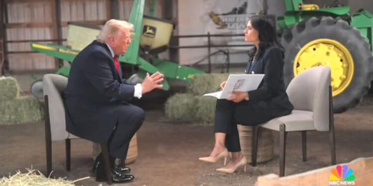 President Donald Trump face-to-face with NBC's Kristen Welker during interview, green tractor in the background