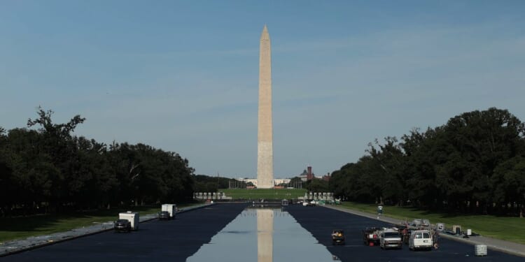 The Washington Monument is seen as the Lincoln Memorial Reflecting Pool fills with water on June 4, 2026, in Washington, D.C.
