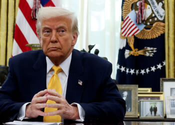 President Donald Trump sits in the Oval Office of the White House in Washington, D.C., March 7, 2025. REUTERS/Leah Millis