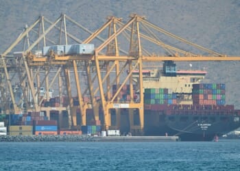 The Marshall Island flagged container vessel K Klaipeda is seen docked along a pier at the Khor Fakkan Container Terminal, the only natural deep-sea port in the region and one of the major container ports in Sharjah Emirate, along the Gulf of Oman on Sunday.