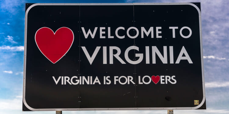Shown is a welcome sign at the entrance to the state of Virginia.