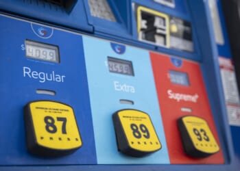 Gas prices exceeding $4 dollars per gallon are displayed