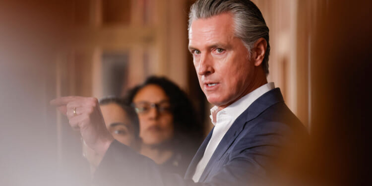 California Gov. Gavin Newsom speaks alongside local and state leaders during a press conference announcing new funding for communities across the state to address homelessness and mental health in Hayward, California Monday, March 2, 2026. The recent election is fueling calls for passage of the SAVE America Act. (Photo by Jessica Christian/San Francisco Chronicle via Getty Images)