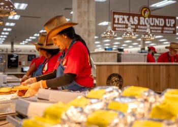 Employees prepare food inside of the Buc-ee's convenience store