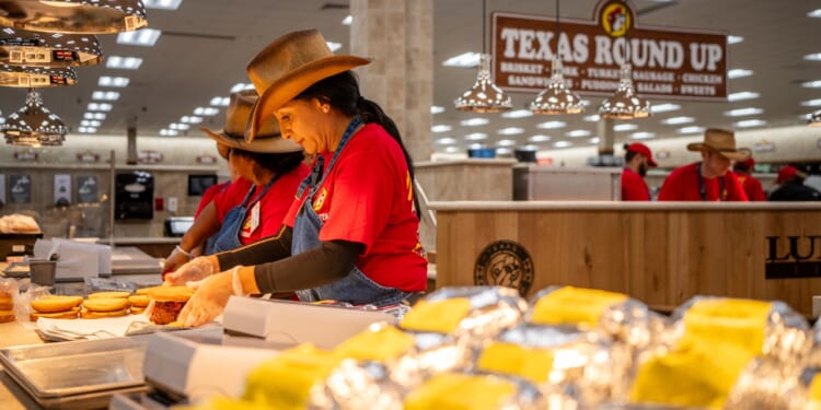 Employees prepare food inside of the Buc-ee's convenience store