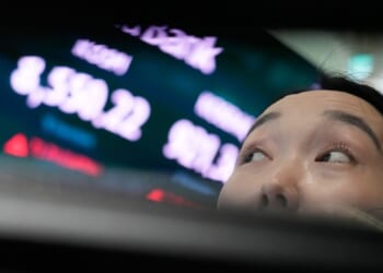 Most U.S. stocks rise, but drops for tech keep Wall Street in check