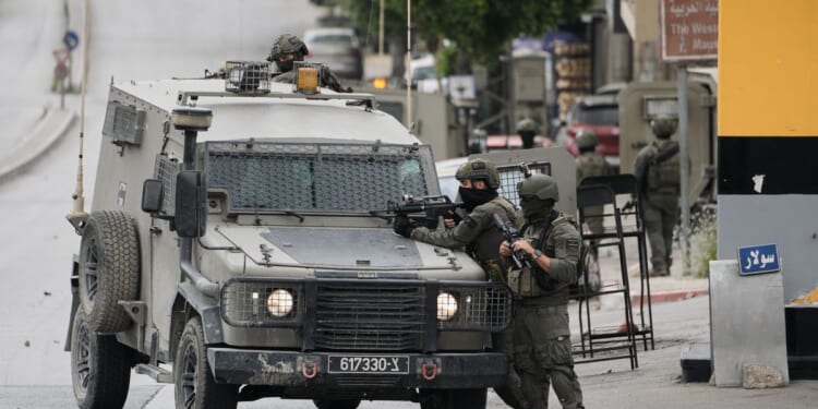 Israeli forces detain Palestinian women in West Bank raids