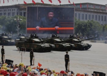 Chinese leader urges speeding up military buildup