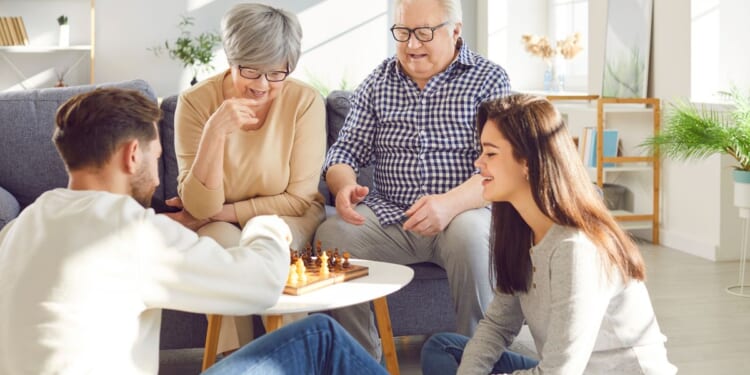 Record 1 in 3 young adults under 35 lived with their parents last year