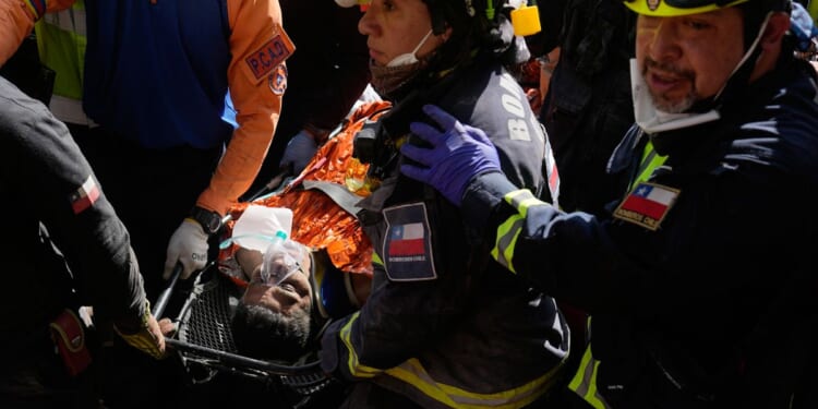 Rescue teams in Venezuela cling to hope as U.S. rebuffs criticisms of government earthquake response