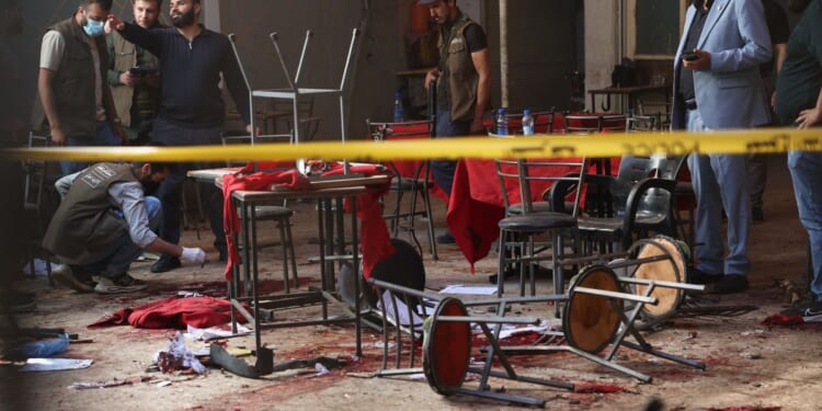Explosive device goes off in cafe in Syria’s capital, killing at least 9 people