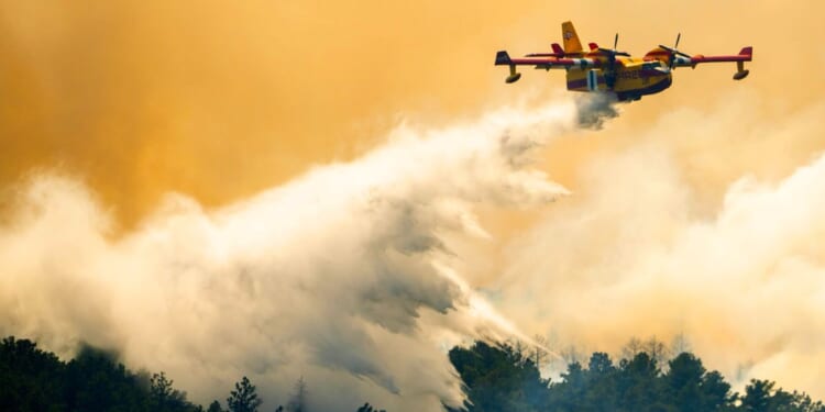 Wildfire southwest of Denver forces thousands to evacuate and destroys more than 160 structures