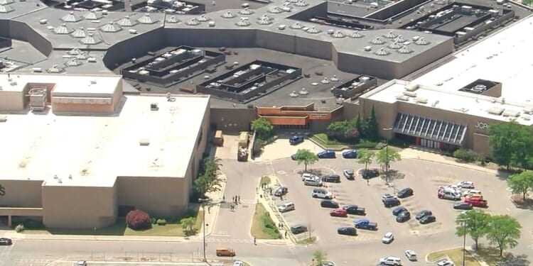 Police investigate a shopping mall shooting that left 2 dead in suburban Detroit