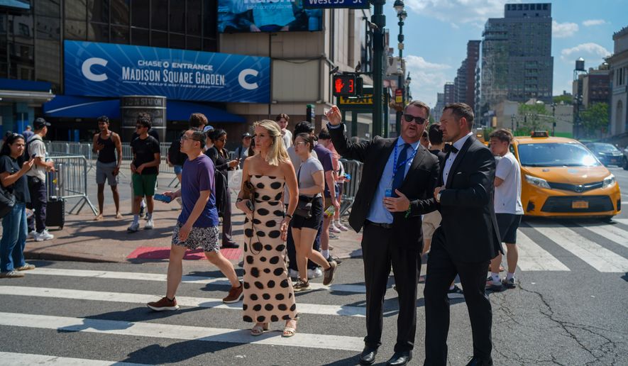 Guests arrive to Madison Square Garden ahead of a reported wedding between singer Taylor Swift and National Football League player Travis Kelce on Friday, July 3, 2026, in New York. (AP Photo/Ryan Murphy)