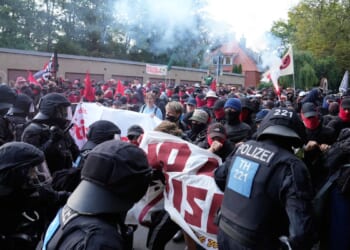 Far-right Alternative for Germany party reelects leaders as protesters and police clash