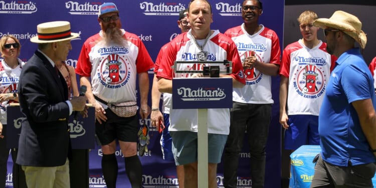 Joey Chestnut scarfs down most July Fourth hot dogs again