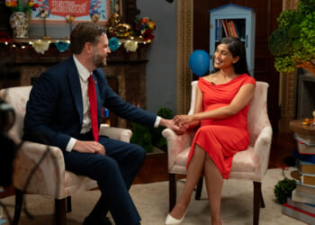 Pregnant Usha Vance wears a maternity dress.