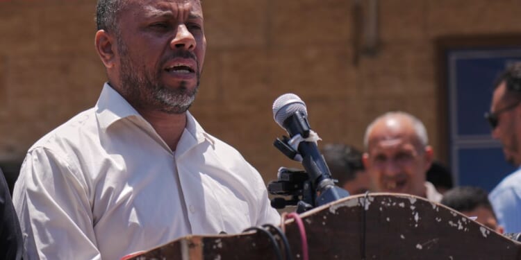 Hamas dissolves its government in Gaza to transfer power to a U.N.-backed committee