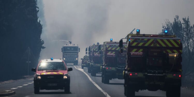 Wildfire bars fans from Tour de France segment as parts of Europe sizzle again under extreme heat