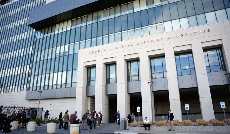 Media reporters wait outside the 4th District Courthouse, ahead of a hearing for Tyler Robinson, accused in the fatal shooting of Charlie Kirk, Monday, July 6, 2026, in Provo, Utah. (AP Photo/Marielle Scott)