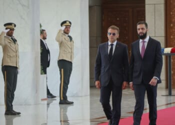 Explosions rock Damascus, wounding 18, as French President Macron visits Syria