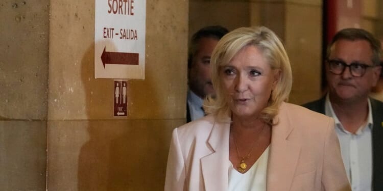 French court clears way for far-right leader Le Pen to run in 2027 but under a condition she rejects
