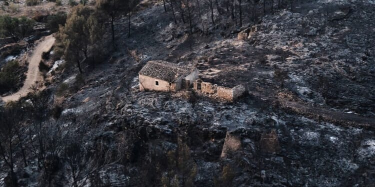 Hundreds of firefighters battle wildfire in southern Spain that killed at least 12