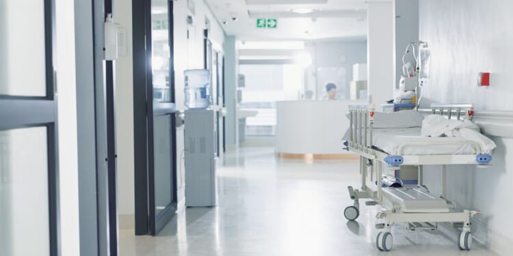 A hospital with an empty corridor.