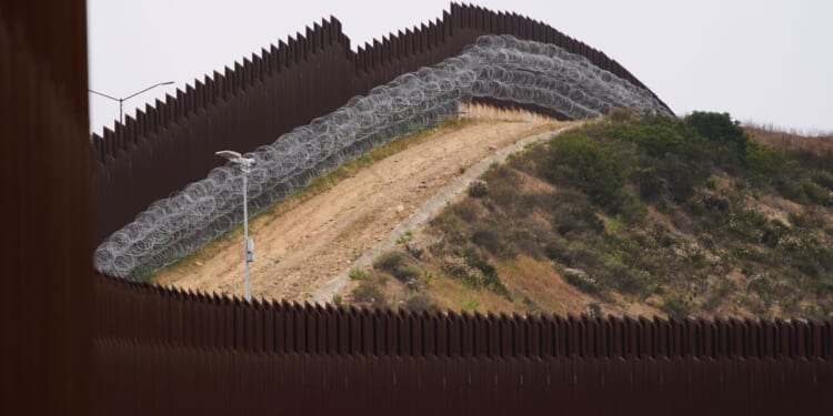 Freedom Caucus presses House leadership for a vote to make Trump’s border policies law